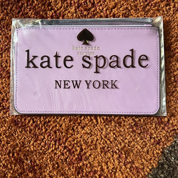 kate spade Handbags - Kate Spade New York wristlet. New in bag. Lavender.